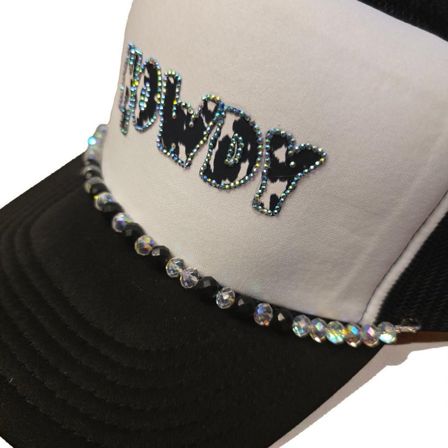 Howdy Cow Print Trucker Hat – Black & White Rhinestone Western Cap with Bling Lettering